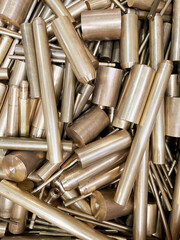 flat view of scrap brass rod off cuts ready to be recycled