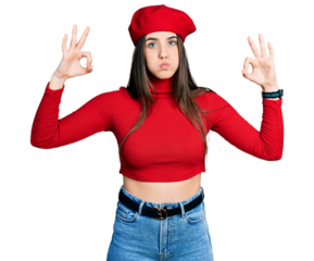 Young brunette teenager doing excellent gesture with hand puffing cheeks with funny face. mouth inflated with air, catching air.