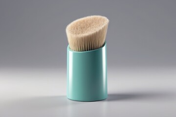 Fototapeta na wymiar Stylish Teal Retractable Makeup Brush for Precision Application in a Minimalist Design