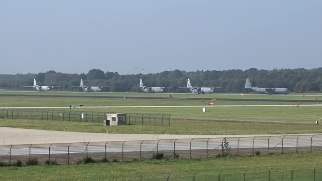Military Airplanes Taxiing at Air Base for Mission