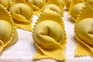 italian spinach and cheese stuffed pasta hand made in pastificio pasta maker