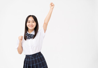 制服を着た日本人女子高校生/応援している/白背景スタジオ撮影	