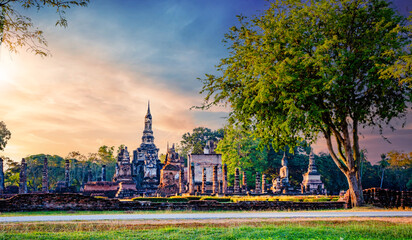 Wat Mahathat Sukhothai historical park at sunset, UNESCO site, World heritage site of Thailand. Travel destination of Thailand.
