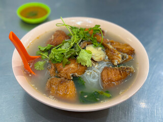 rice noodles fish soup in bowl