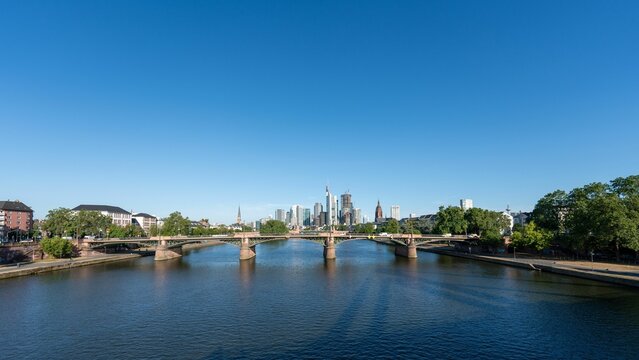 Ignatz Bubis Bridge over River Main on a sunny day at Frankfurt, Germany