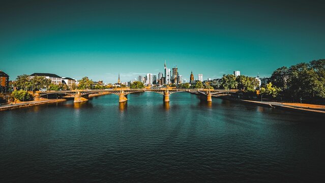 Ignatz Bubis Bridge over River Main on a sunny day at Frankfurt, Germany