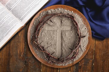 Cross crucifix made of ash, christian religion.