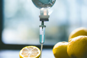 Natural orange fruits vitamin c nutrition iv drip therapy drug treatment concept.