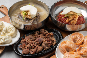 Korean food, Pyongyang, dumplings, cold buckwheat noodles, bibim, Kaesong, charcoal fire, grilled, spicy, pork, and king dumplings