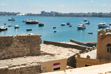 ALEXANDRIA, EGYPT - 14 JUNE 2023 : The Qaitbay Citadel, the famous landmark in Alexandria located...