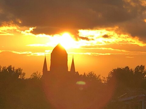 Aerial view of Kath Kirchengemeinde Maria church in Germany at sunset