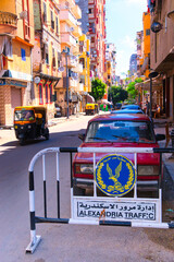 14 06 2023 Alexandria, Egypt, the streets of an ancient African city filled with people and trams. This was on a hot sunny summers day. - obrazy, fototapety, plakaty