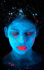 Face, neon and psychedelic paint for color, art and glitter with unique surreal glow. Person,...