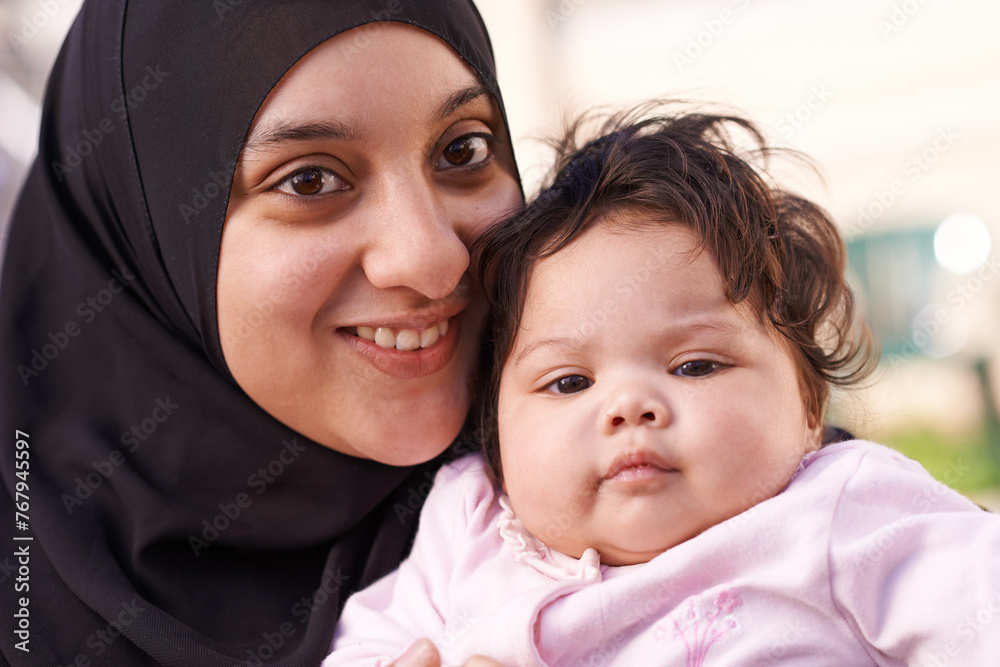 Wall mural muslim, happy and portrait of mother with baby in home for bonding, relationship and calm together. 