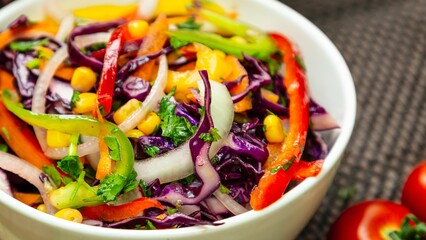 Closeup shot of a bowl of gourmet red cabbage salad with other vegetables