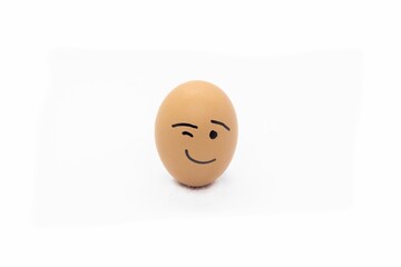 an egg with a drawn flirtish expression