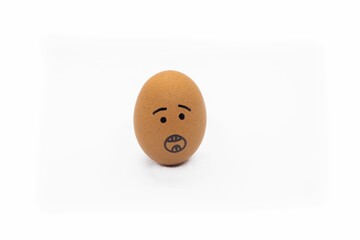 an egg with a drawn face with an open mouth