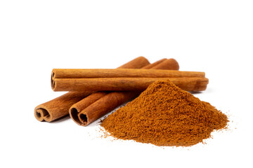 Cinnamon sticks and heap of powder isolated on white background