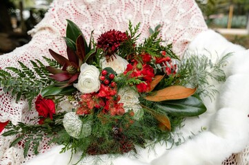 Beautiful bouquet of flowers arranged on a chair for a wedding ceremony