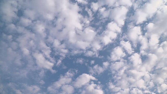 Moving fluffy clouds in the sky, Awe in windy day forecast. Time Lapse
