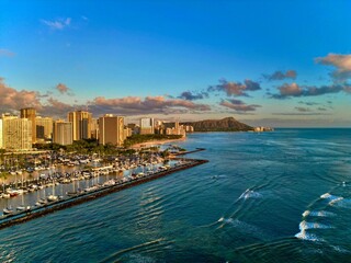 View of a vibrant cityscape of Diamond Head Sunset, Waikiki, Hawai'i