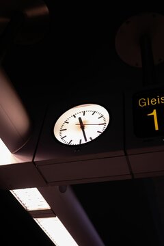 Illuminated clock at the train station in Germany.
