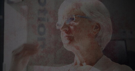 Image of moving background over sad senior caucasian woman