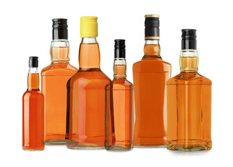 Many bottles of whiskey isolated on white, set