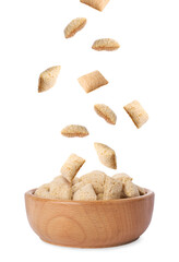 Corn snack. Cereal pads with filling falling into bowl against white background