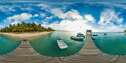 Beautiful 360 degree panorama at the beach of Trou Aux Biches Mauritius at sunset with no people.