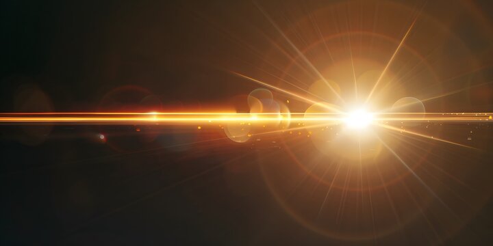 A yellow lens flare with a black background