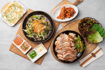 Korean food, pig's feet, pork, bossam, lettuce, perilla leaves, spicy, garlic, pepper, salted shrimp,