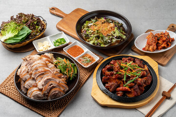 Korean food, pig's feet, pork, bossam, lettuce, perilla leaves, spicy, garlic, pepper, salted shrimp,