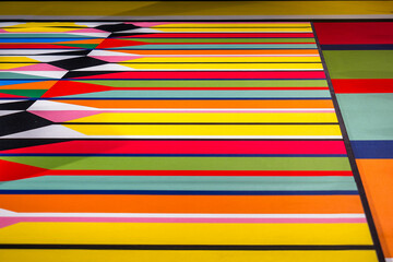 a painting of a multicolored pattern on the ground