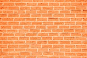 Obraz premium Close-up view of a brick wall featuring subtle cracks in the surface