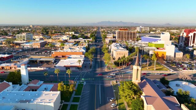 Mesa city center aerial view including Church of Jesus Christ of Latter day Saints and First United Methodist Church on Center Street at 1st Avenue at sunset, Mesa, Arizona AZ, USA. 