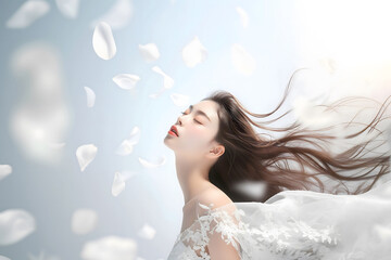 アジア系の若い女性がウェディングドレスを着て
気持ち良さそうにしている様子