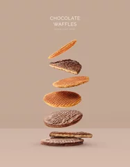  Creative layout made of chocolate stroopwafel on beige background. Flat lay. Food concept. Macro  concept. © StudioDFlorez