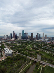 Downtown Houston, Texas skyline with traffic in the background on a busy freeway