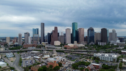 Downtown Houston, Texas skyline with traffic in the background on a busy freeway