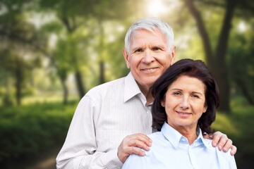 Obraz premium Wonderful cheerful senior couple at nature background