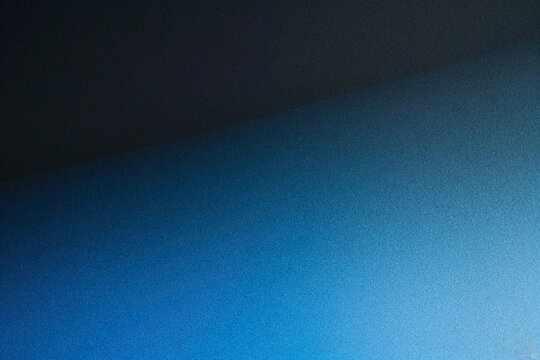 a black and blue background wallpaper, infused with extreme noise effects and gritty grain textures, exuding a raw and edgy aesthetic perfect for tech enthusiasts