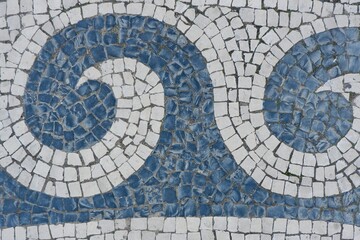 Curved traditional mosaic. Tiled Pavement in Portugal