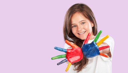 A beautiful little child with multicolored hands