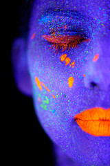 Face, neon and psychedelic closeup for creative, art and glitter with unique surreal glow. Person,...
