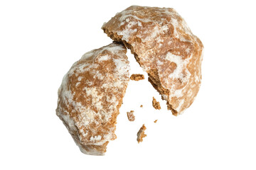 Gingerbread is broken in half with crumbs scattered. Isolation on a transparent background.