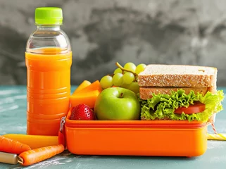  Healthy School Lunch Box with Sandwich, Fruit, Vegetables, and Water Bottle for Kids Education Concept © SHOTPRIME STUDIO
