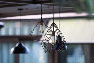 Fashionable ceiling lamps. Ceiling lighting. Loft Design. Ceiling chandeliers in loft style. Industrial design based on the geometry of shapes.