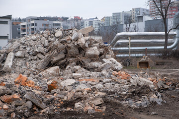 Piles of rubble from demolished house walls. Construction ruined destroyed debris. Concept of old...