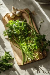 Fresh vegetables and herbs on bright rustic kitchen counter top.